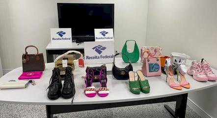 Bolsas, óculos e sapatos: Receita Federal apreende R$ 200 mil em itens de luxo em bagagem